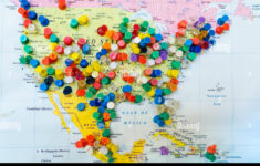 Many Colourful Pins In A Wall Map Of America The Map Is Hanging On