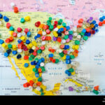 Many Colourful Pins In A Wall Map Of America The Map Is Hanging On
